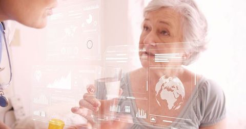 Senior woman consulting clinician through digital health interface holding glass and pills