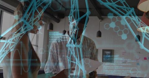 Coworkers Reviewing Documents with Augmented Reality Graphics Overlay