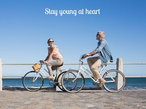 Senior Couple Enjoying Bicycle Ride by the Sea for Active Lifestyle - Download Free Stock Templates Pikwizard.com