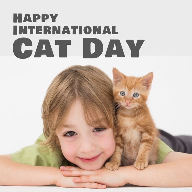 Digital composite of caucasian cute boy with ginger kitten and happy international cat day text. portrait, copy space, childhood, love, togetherness, pet, animal, protection and awareness concept.