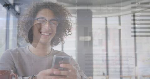 Smiling Man Engaging with Smartphone Amid Digital Holographic Data - Download Free Stock Images Pikwizard.com