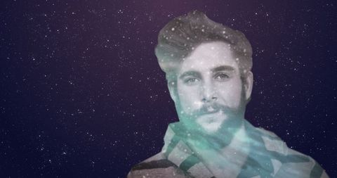 Contemplative man with cosmic space overlay and starry sky