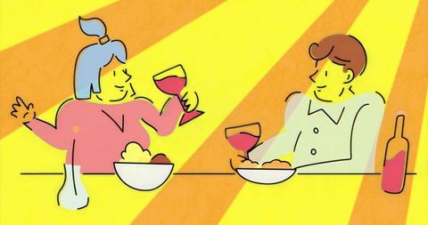 Couple Toasting with Wine Over Romantic Dinner