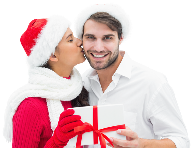 Smiling Couple With Christmas Gift Wearing Santa Hats on Transparent Background - Download Free Stock Videos Pikwizard.com