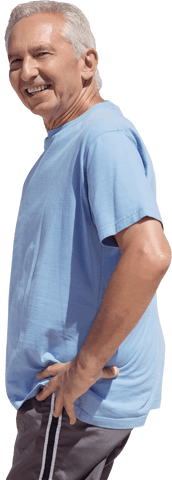 Joyful senior man with hand on hip, blue shirt neutral background transparent