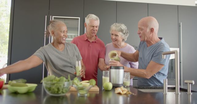 Happy Senior Friends Making Smoothies in Modern Kitchen - Download Free Stock Images Pikwizard.com