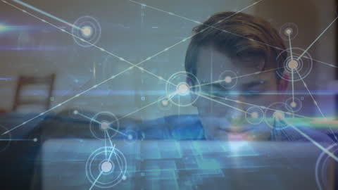 Man Using Laptop with Digital Network Overlay