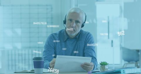 Business Professional Analyzing Data with Digital Overlay