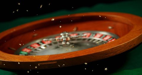 Spinning Roulette Wheel with Falling Gold Stars - Download Free Stock Images Pikwizard.com