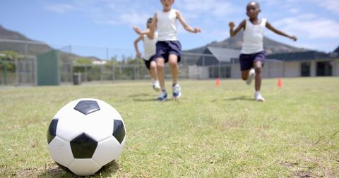 Children Playing Soccer On School Field Having Fun Outdoors - Download Free Stock Images Pikwizard.com