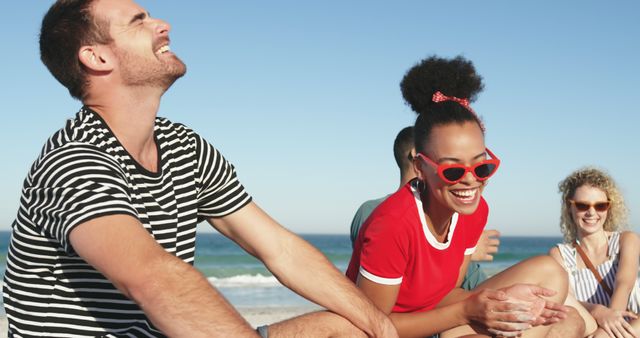 Friends Enjoying Beach Day and Laughing Together - Download Free Stock Images Pikwizard.com