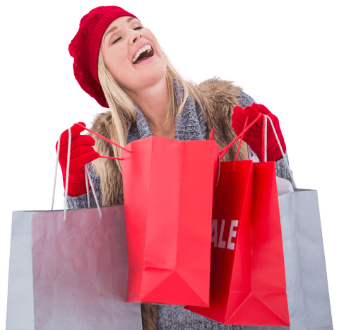 Cheerful woman in winter attire with sale shopping bags transparent background