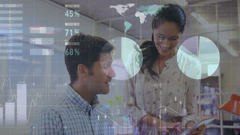 Business Professionals Analyzing Data with Digital Tablet