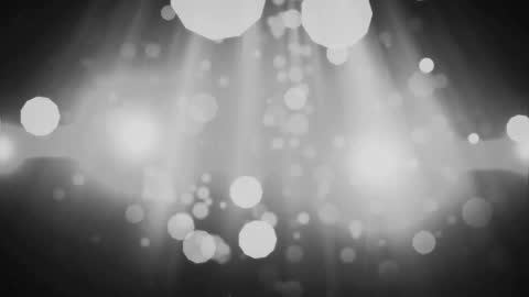 Abstract Light Trails and Spots Animation on Black Background