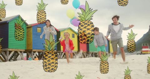 Family Enjoying with Pineapples at Vibrant Beach Huts - Download Free Stock Images Pikwizard.com