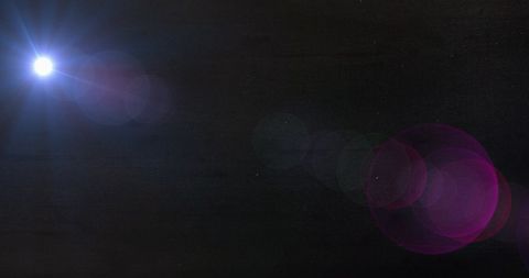 Abstract Lens Flare on Dark Background - Download Free Stock Images Pikwizard.com