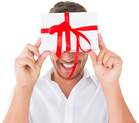 Caucasian man holding gift box celebrating transparent background