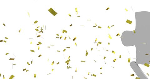 Gold Confetti Floating as Celebratory Imagery with Puzzle Piece