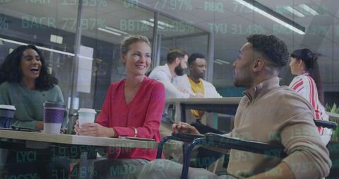 Diverse Business Team Discussing Financial Strategies in Office