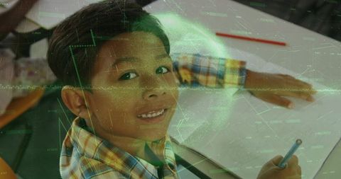 Smiling Schoolboy Engaged in Classroom Activities