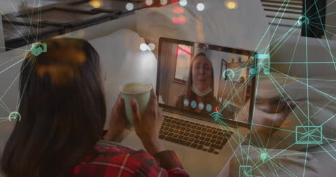Woman Enjoying Video Call with Futuristic Digital Interface Overlay