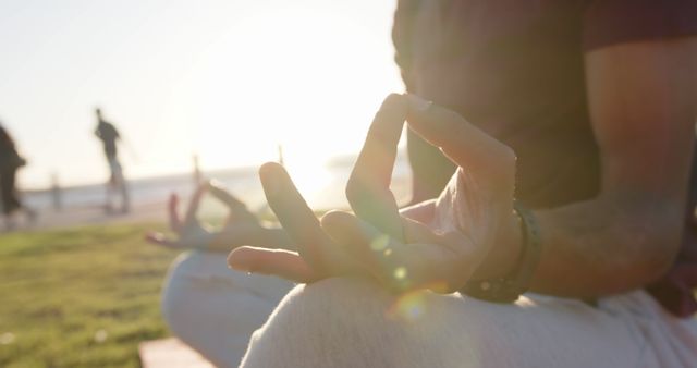 Peaceful Meditation Outdoors During Sunrise by the Beach - Download Free Stock Images Pikwizard.com