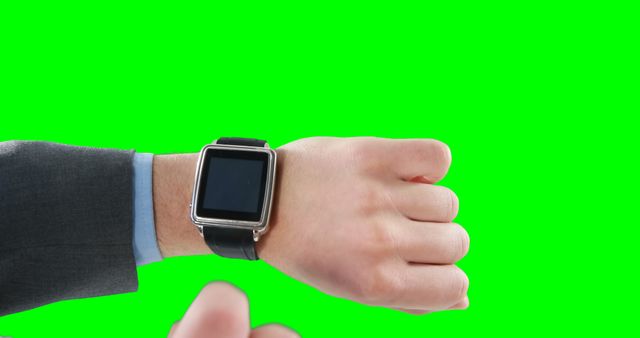 Businessman Checking Time on Smartwatch with Green Screen Background - Download Free Stock Images Pikwizard.com