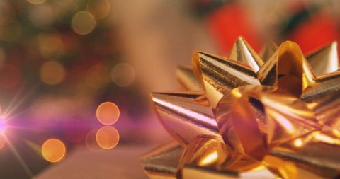 Golden Christmas Bow with Glowing Abstract Lights - Download Free Stock Images Pikwizard.com