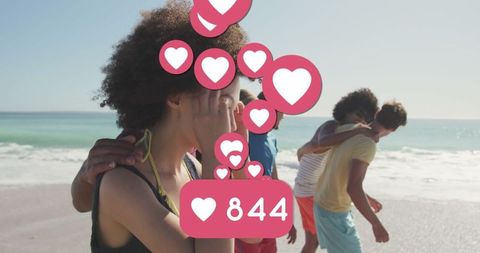 Friends Enjoying Beach with Social Media Icons Overlay