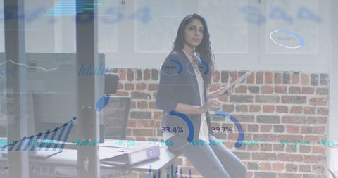 Confident Businesswoman Using Tablet with Stock Market Graphics