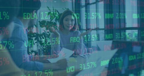 Asian Businesswoman Questioning Stock Market Trends in Modern Office