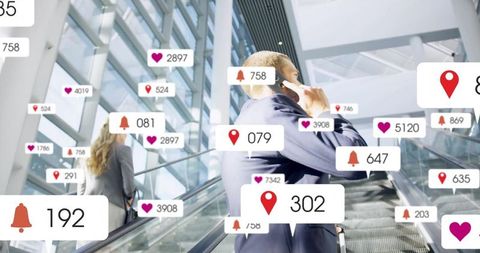 Business executive surrounded by social media notifications