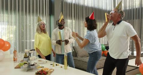 Joyful office celebration with diverse team members and fall colors