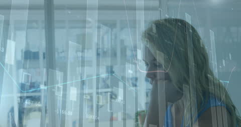 The video features a Blonde businesswoman in a modern office environment with digital financial data graphics superimposed, symbolizing technology-enabled data processing. This is a great choice for marketing materials related to finance, technology, data analytics, and modern workplace solutions. It can be used for websites, brochures, or blogs discussing financial success, digital finance applications, and professional efficiency.
