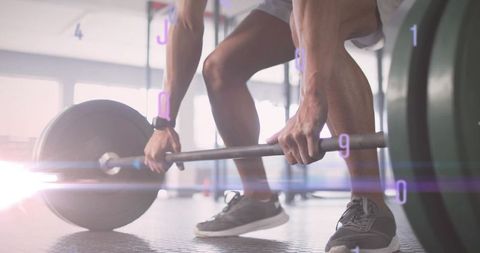 Athlete lifting barbell with modern digital overlay effects