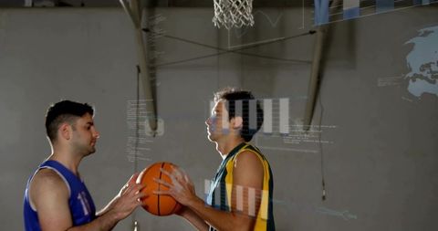 Two basketball players facing off under hoop with hud overlay showing performance data