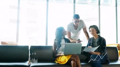 Team Collaborating on Data Analysis with Digital Tools in Modern Office