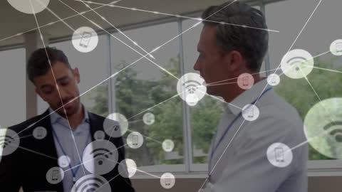 Coworkers Discussing Ideas with Animated Connected Network Icons