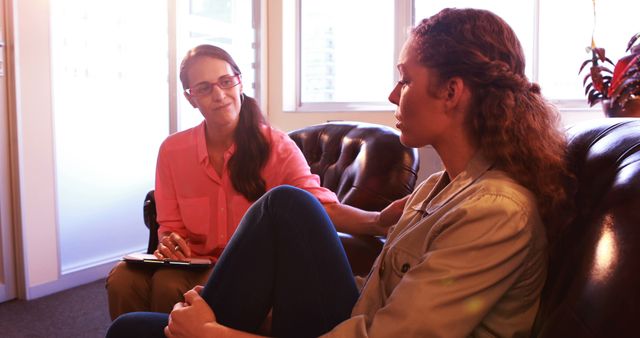 Therapist Consoling Distressed Young Woman During Session - Download Free Stock Images Pikwizard.com