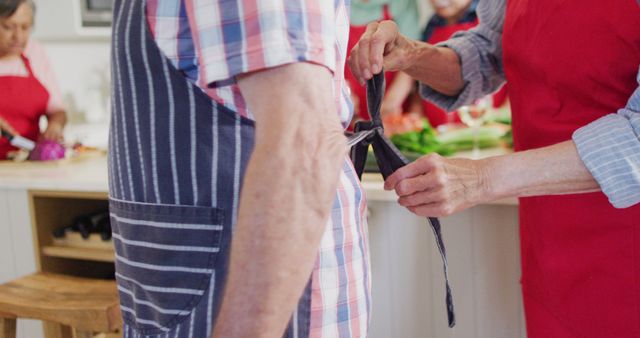 Senior Adults In Cooking Class Tying Apron - Download Free Stock Images Pikwizard.com