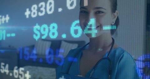 Smiling nurse holding tablet with financial data overlays for telemedicine analytics and finance