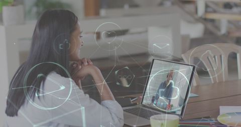 Woman Video Calling as Digital Icons Overlay Screen
