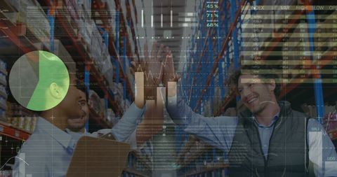Diverse Warehouse Workers Celebrating Success with Financial Growth Charts Overlay - Download Free Stock Images Pikwizard.com
