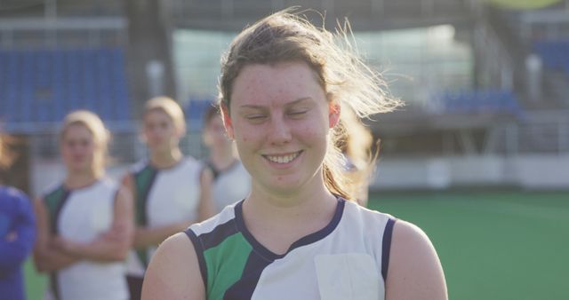 Female Field Hockey Player Smiling During Practice - Download Free Stock Images Pikwizard.com