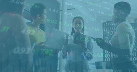 Diverse businesswomen analyzing stock market trends together