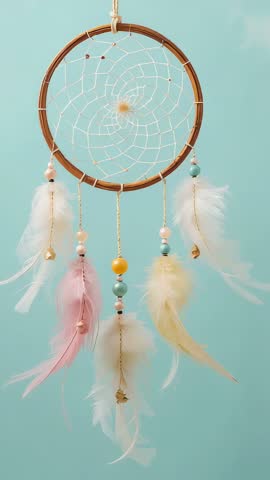 Swaying Pastel Dreamcatcher Moving Slowly with Feathers and Beads Vertical Boho Video