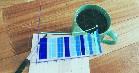 Mint-green coffee mug with blue growth chart overlay on wooden desk flatlay for business analytics