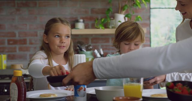 Family Enjoying Breakfast Together in Cozy Kitchen Interior - Download Free Stock Images Pikwizard.com