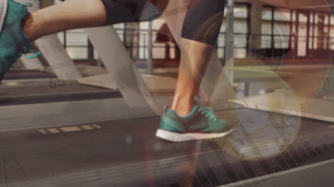 Fit Couple Exercising on Treadmills in Gym with Futuristic Design