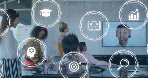 Diverse Business Team Analyzing Data with Digital Icons